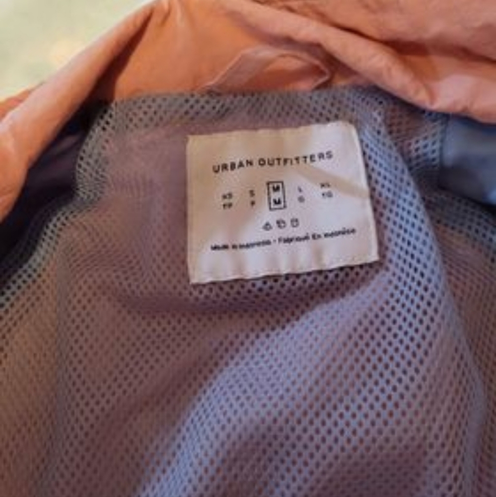 Urban Outfitters light pink rain jacket
